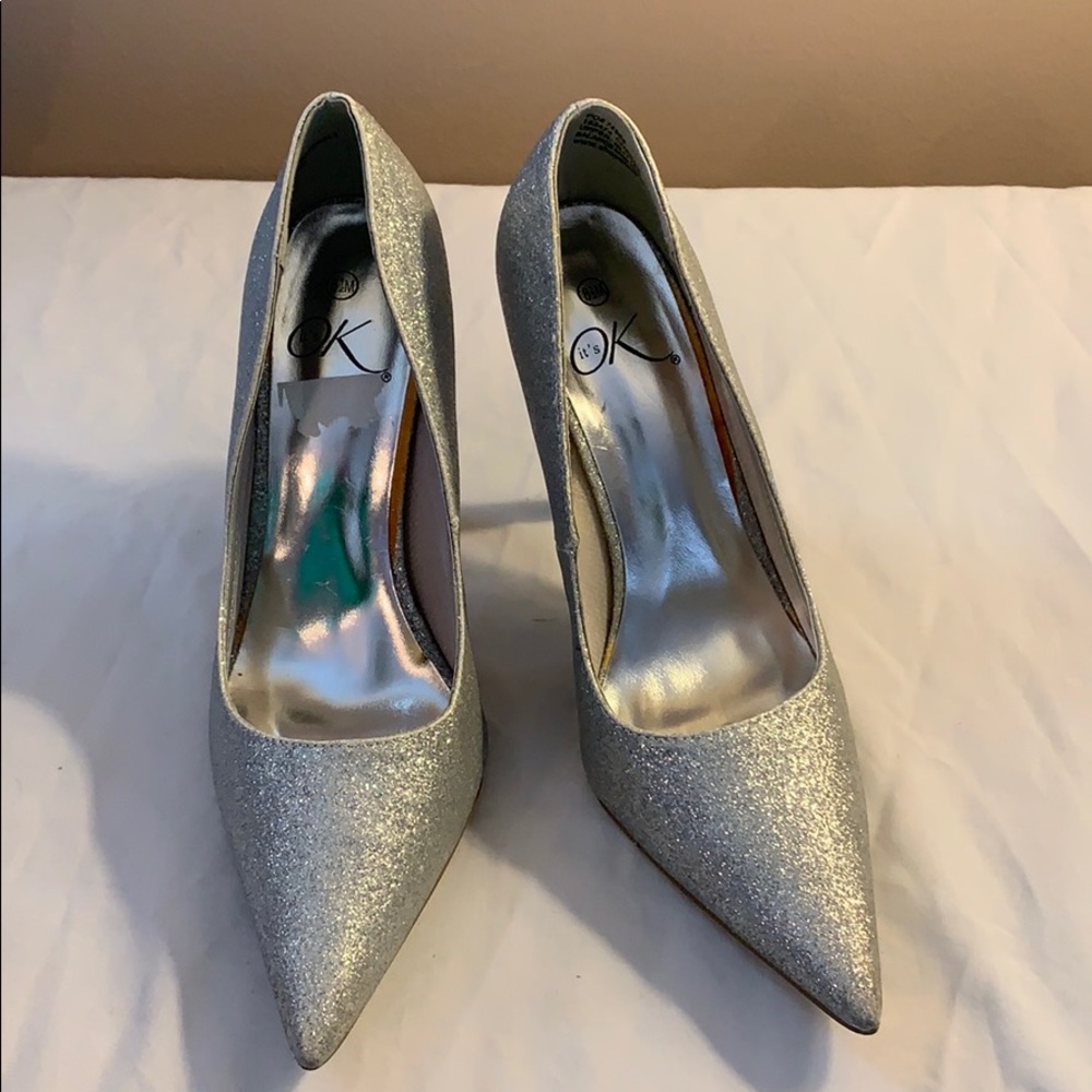 Once worn silver glitter stilettos
